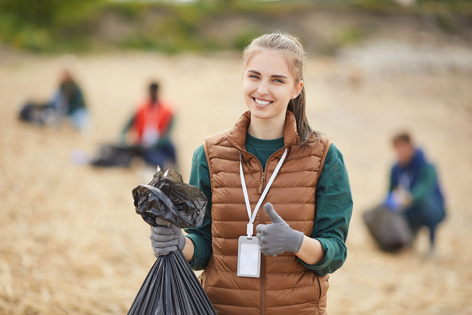 volunteer-with-garbage-outdoors-2021-08-28-11-56-56-utc.jpg